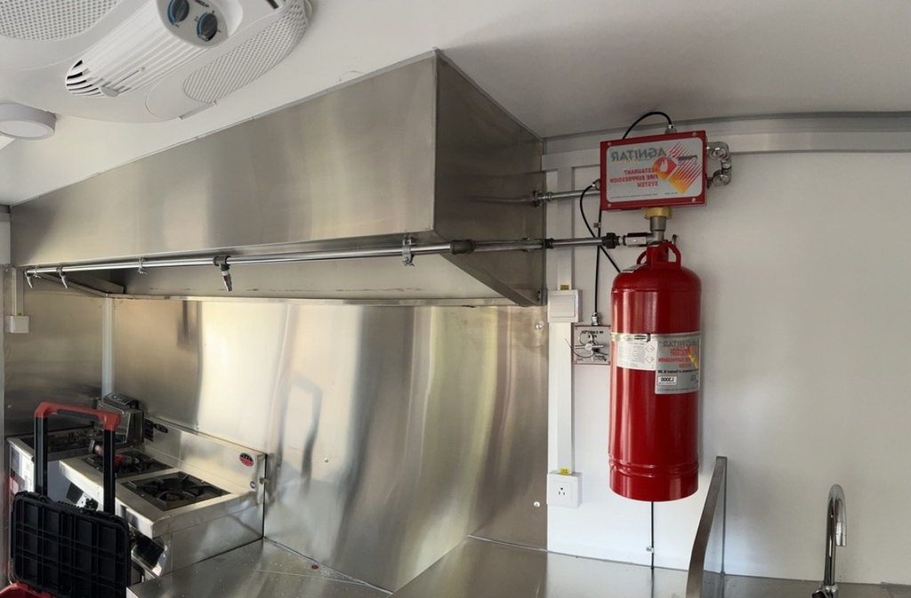 Installed Agnitar Kitchen Fire Suppression System – wet chemical Class K fire protection for restaurants and hotels.